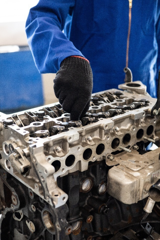 a man repairing an engine