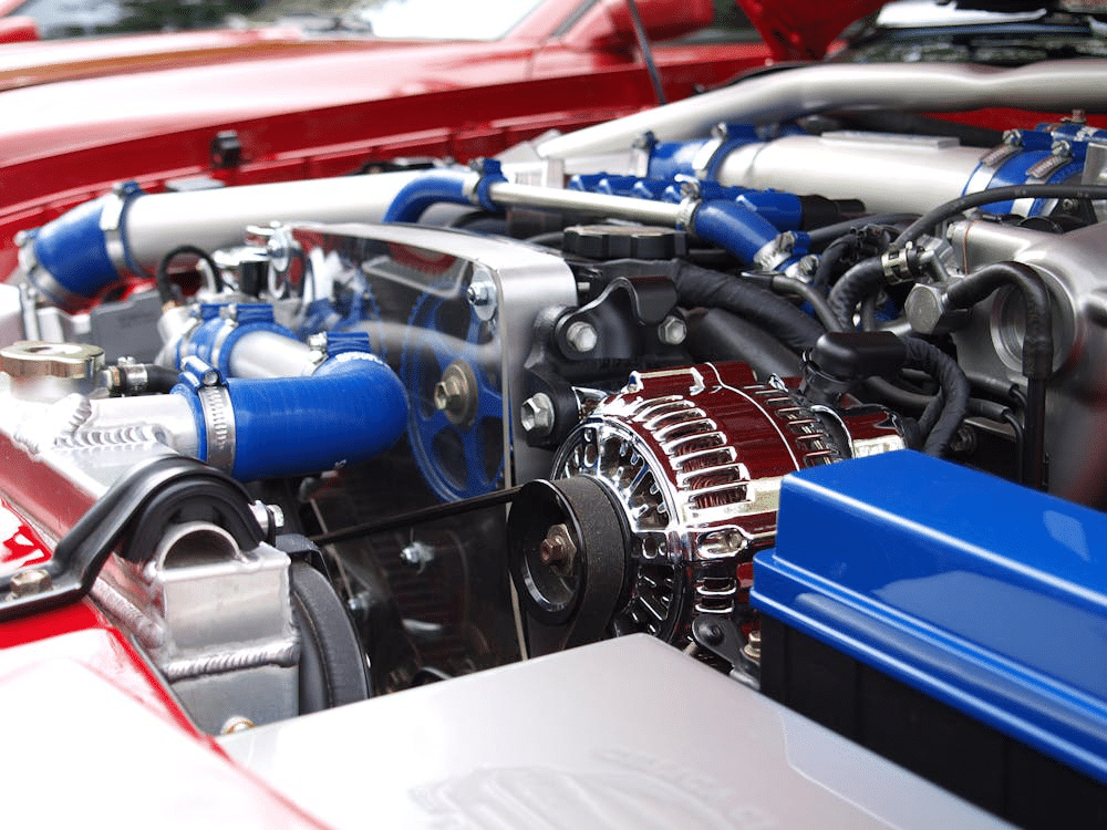 Car engine with blue, silver, and black components